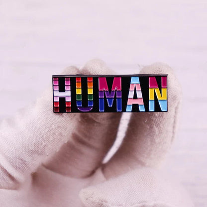 HUMAN Enamel pin - PrideBooth